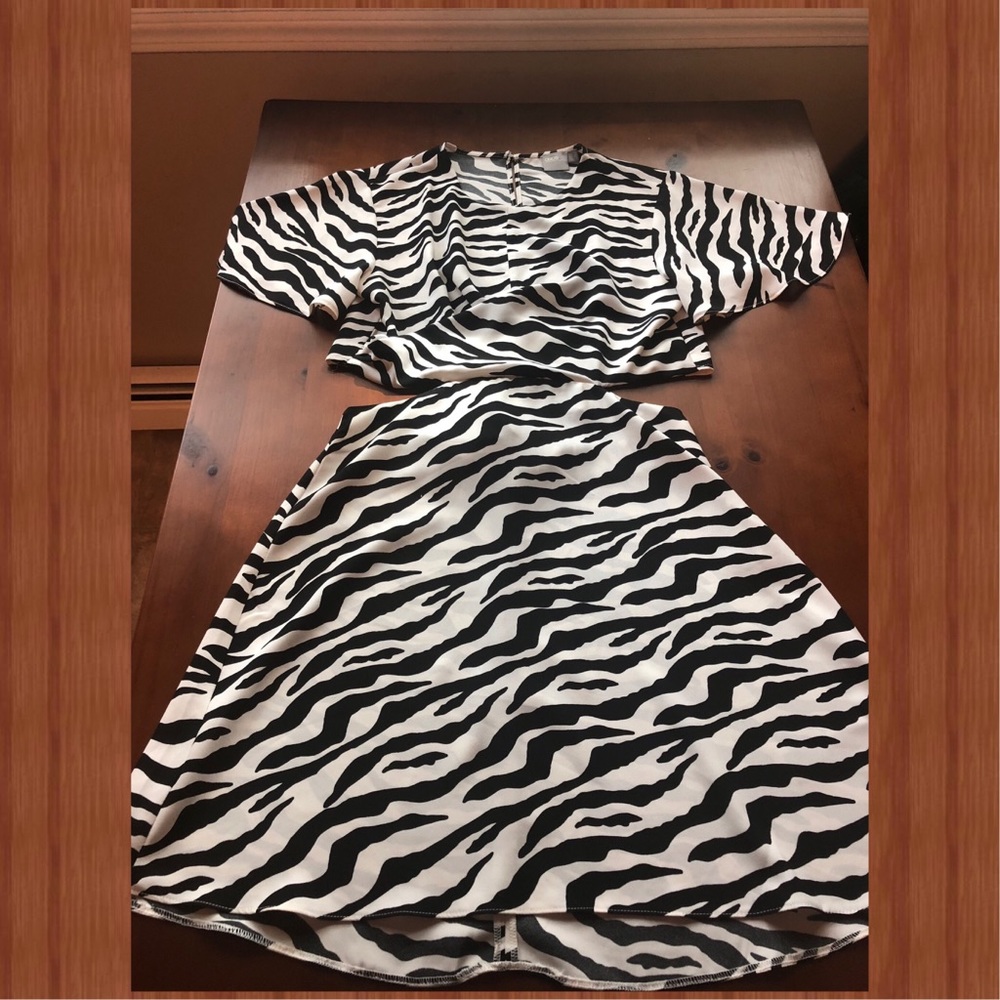 3 for $50 Cutout animal print dress.